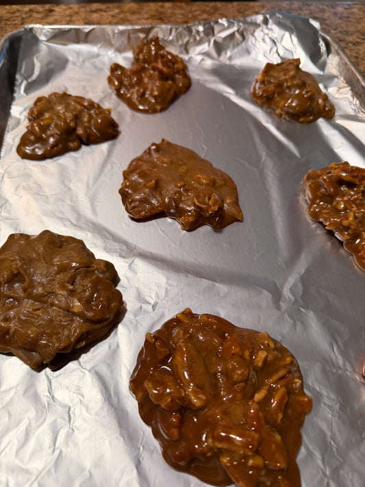 Microwave pralines on aluminum foil, member submitted recipe by Rina Trochman, Foodies of Lafayette