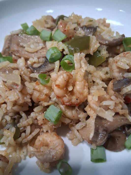 Crawfish Opelousas cooked with rice, onions and mushrooms