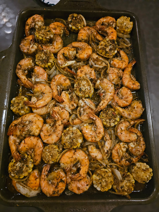 Barbecue shrimp with corn and sausage in butter sauce, member submitted recipe by Jason Thibeaux, Foodies of Lafayette